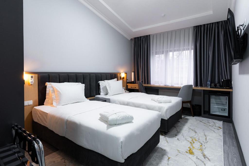 Rauza Hotel twin guest room